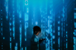 A young child stands in a dark digital environment, illuminated by the glow of a tablet, surrounded by floating blue binary code.